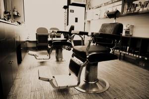 Two rotating barber chairs